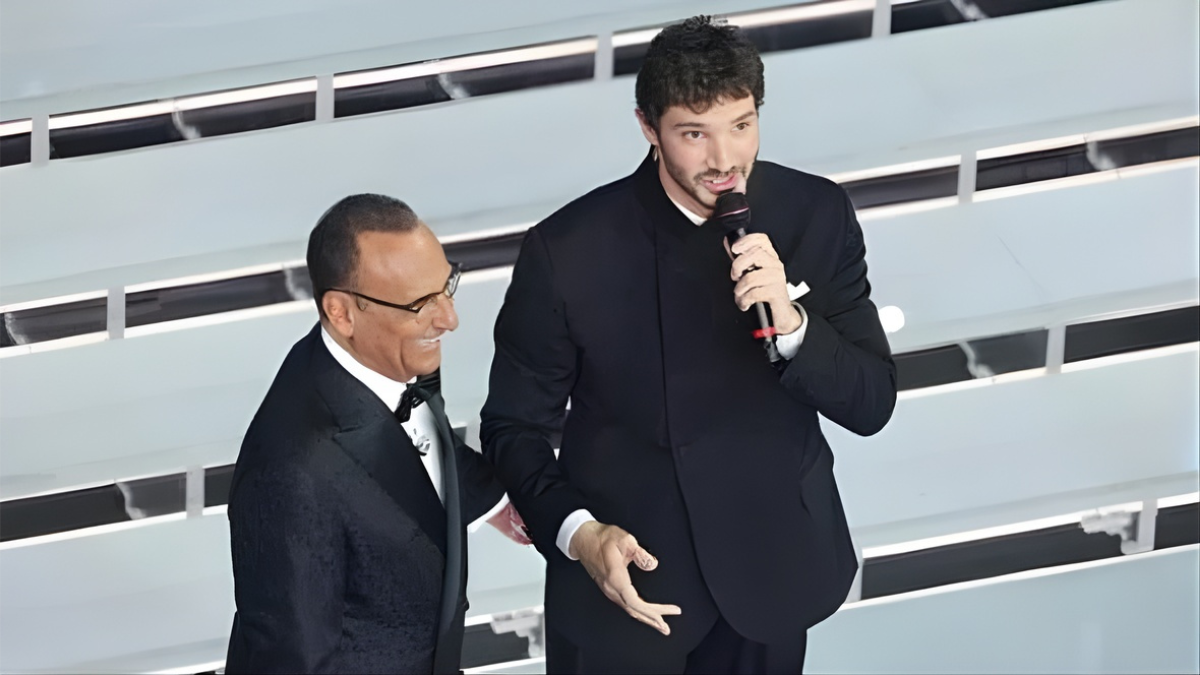 Sanremo 2027, la reazione di Stefano De Martino dopo l’investitura in diretta: “Un onore vero, ora testa bassa e pedalare”